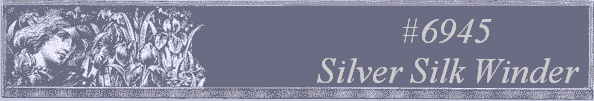 #6945 
Silver Silk Winder 