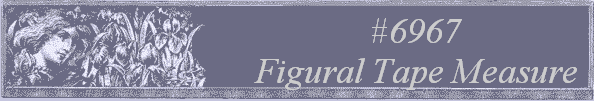 #6967 
Figural Tape Measure 